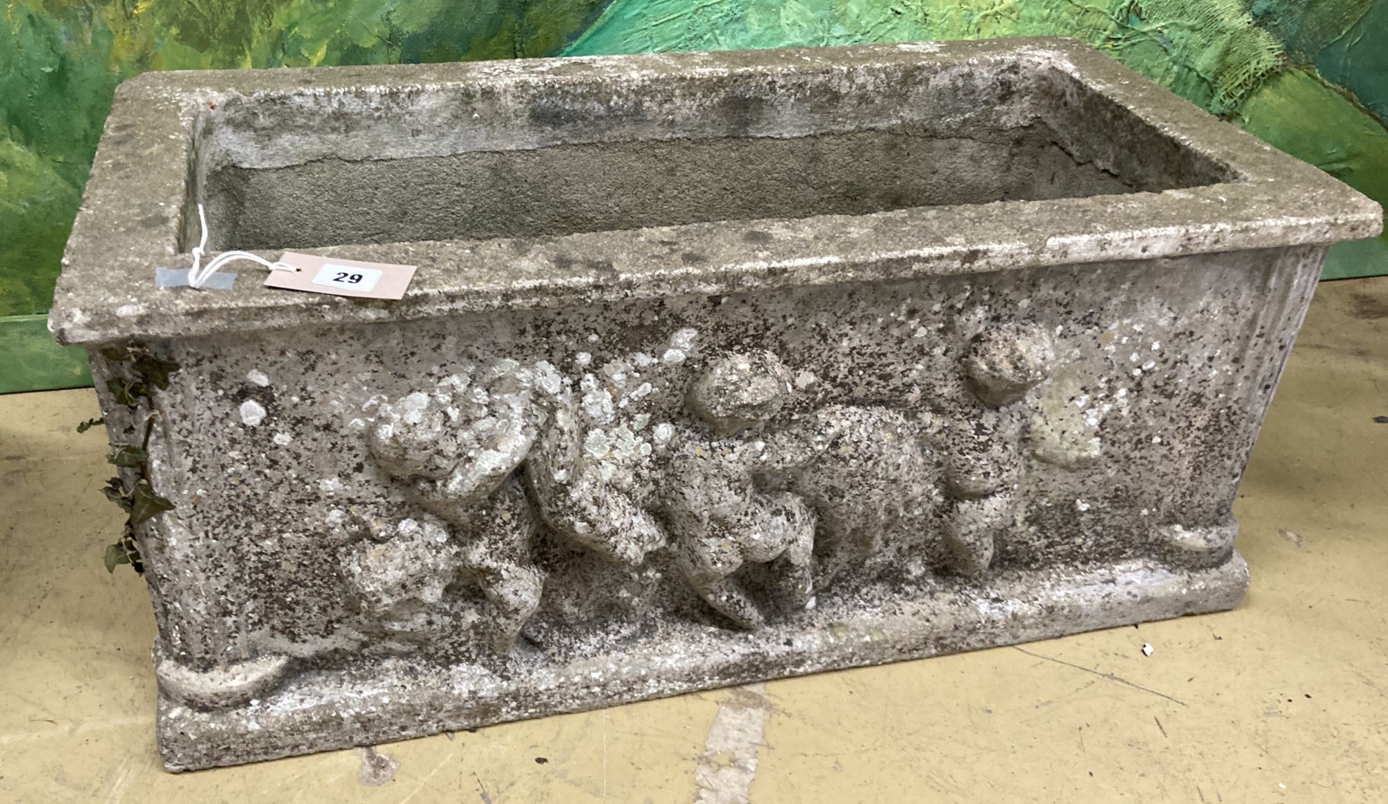 A rectangular reconstituted stone garden planter, width 77cm, depth 38cm, height 32cm